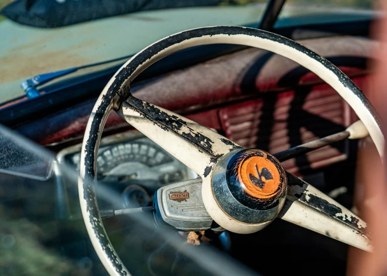 an old car with dirty and worn interior