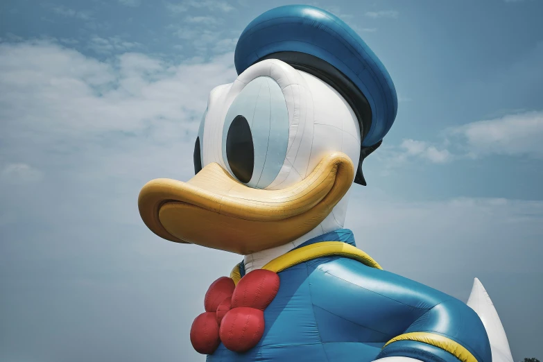 a big balloon with a donald duck face