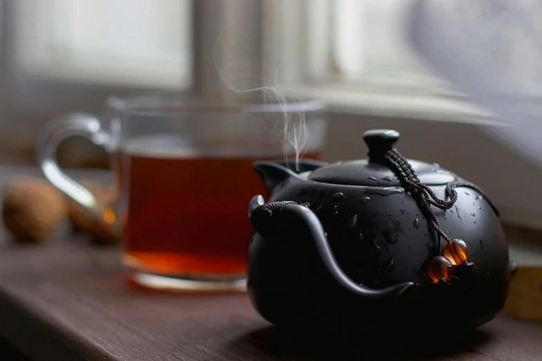 there is an interesting teapot on a table
