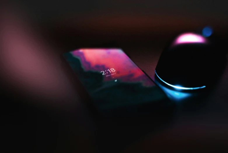 the view of an iphone screen and a mouse