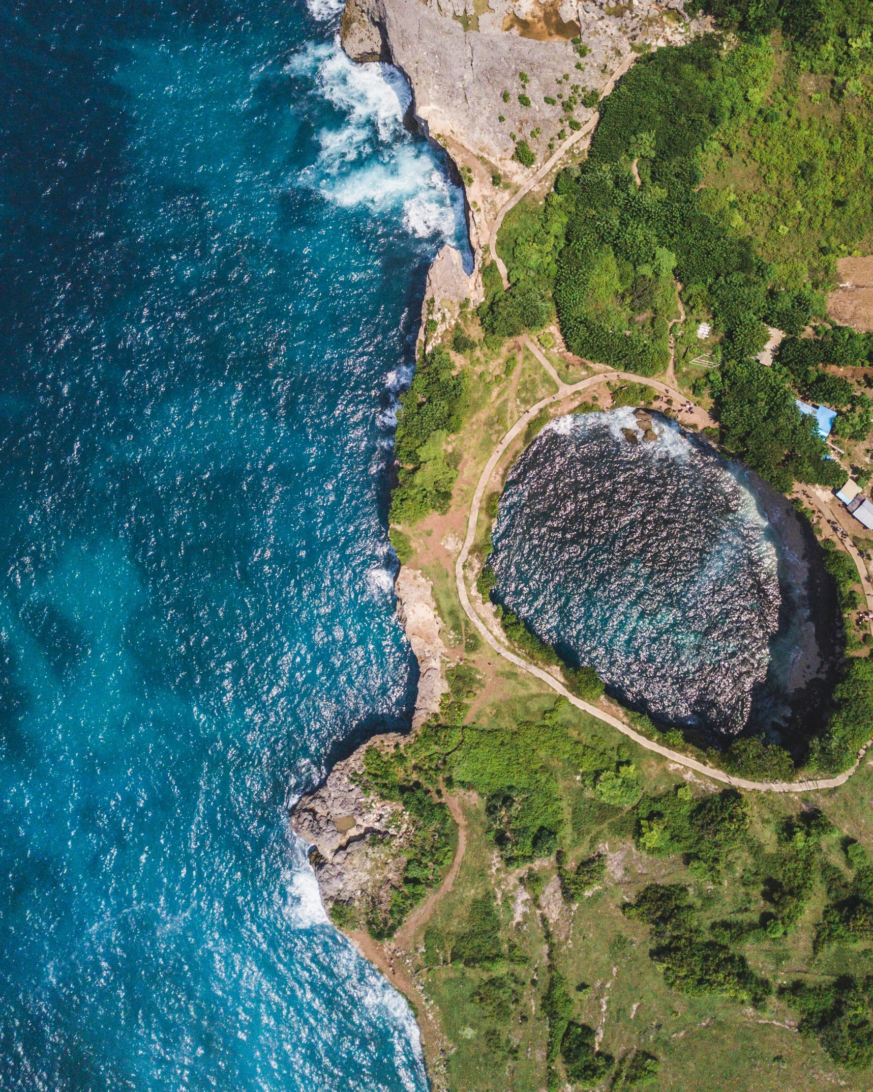 an aerial view of a coastline near the ocean