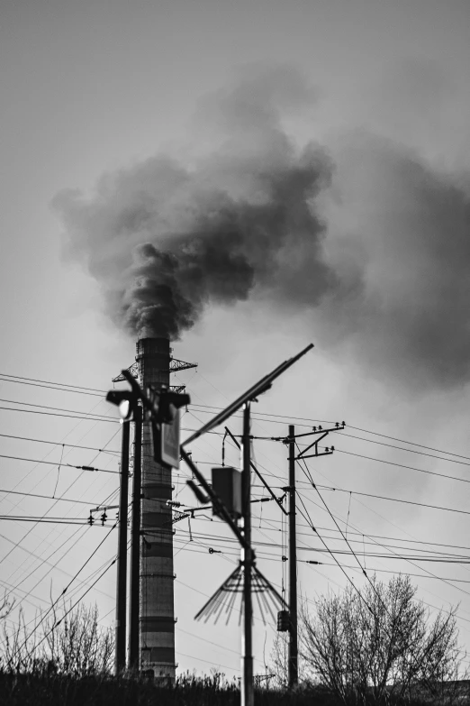 a large chimney with smoke coming out of it