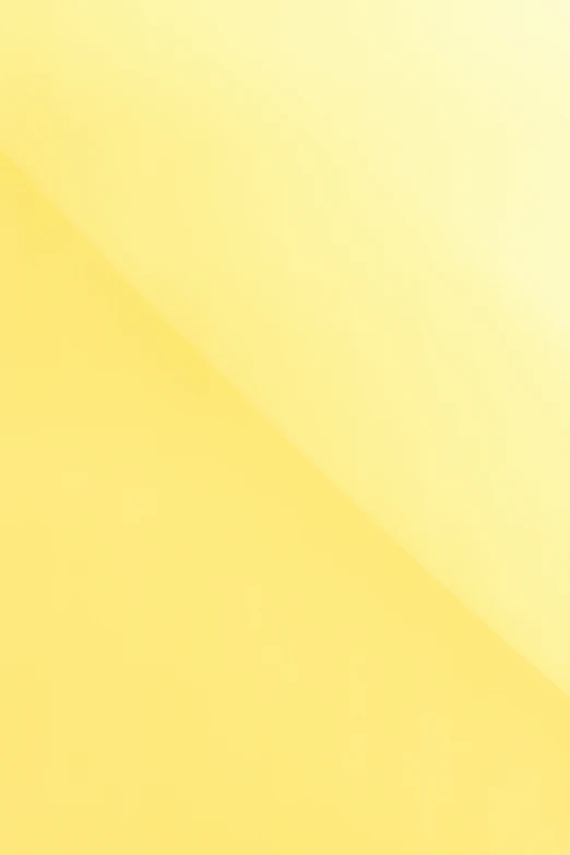 the corner of an abstract white and yellow background