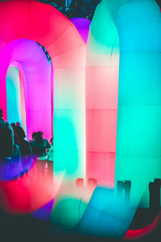 a large inflatable arch sitting inside of a building