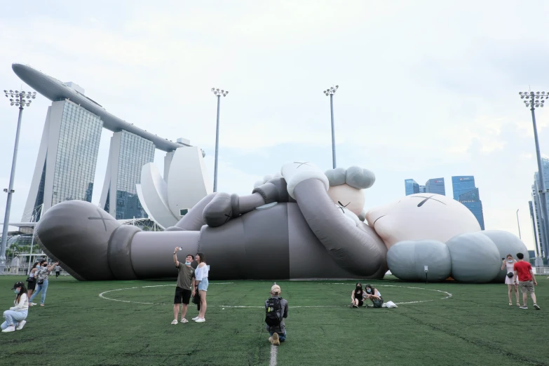 people are playing football outside in an inflated character