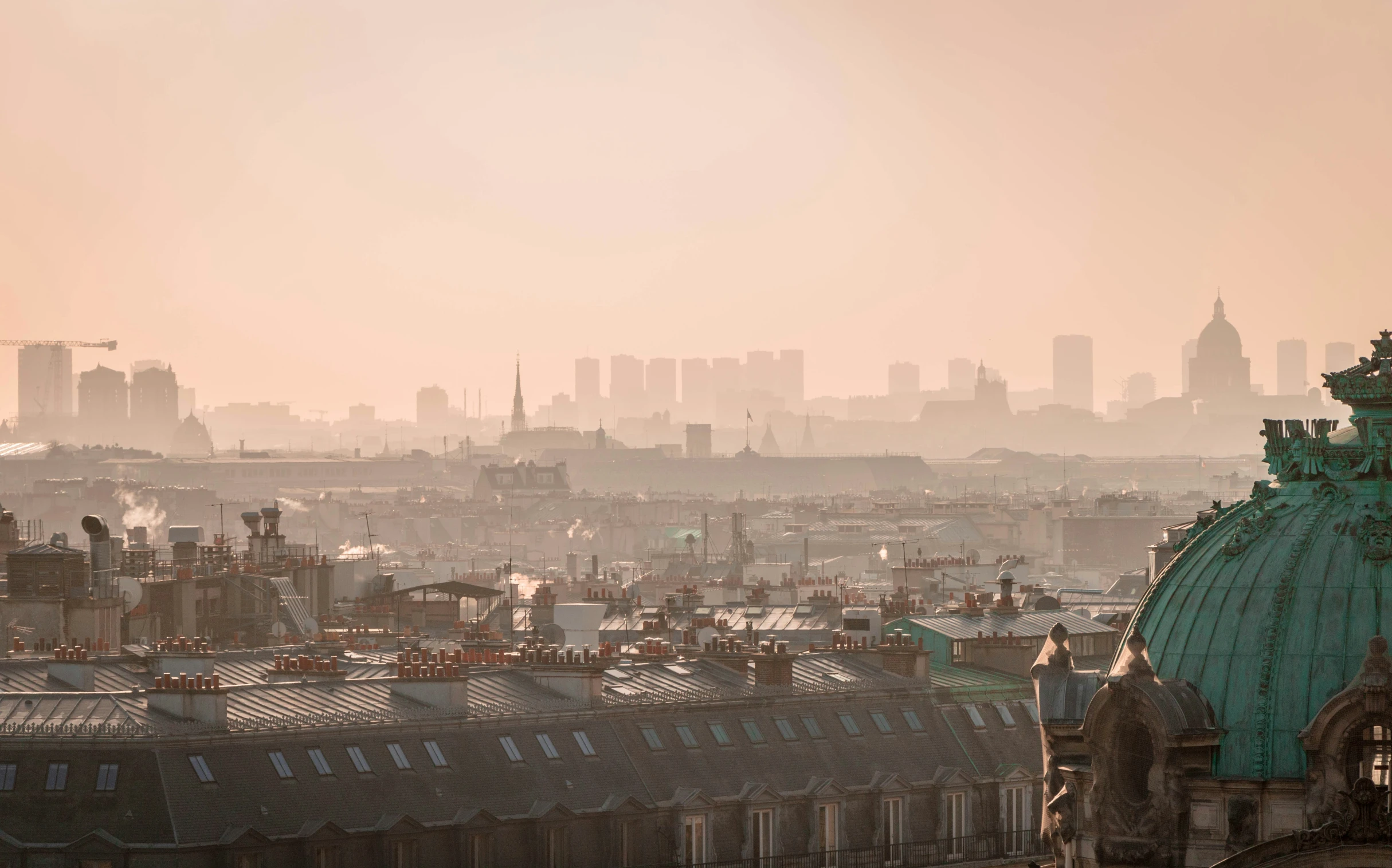 a city skyline is seen from an elevated position