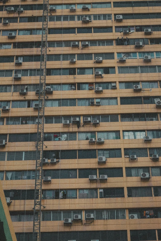 an image of some windows on the side of an old building