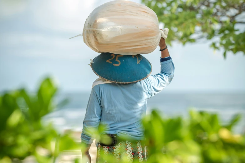 a person carrying a large bag on their back