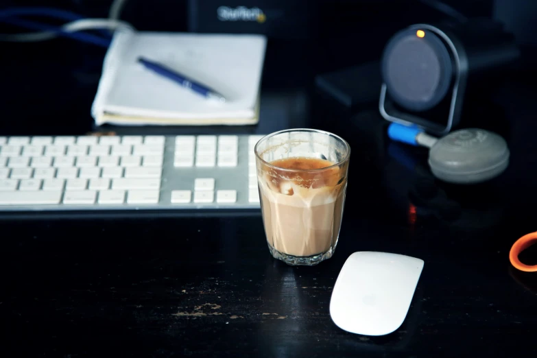 a computer keyboard with a mouse next to it