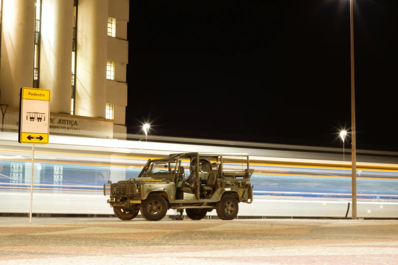 a utility vehicle parked in front of a building