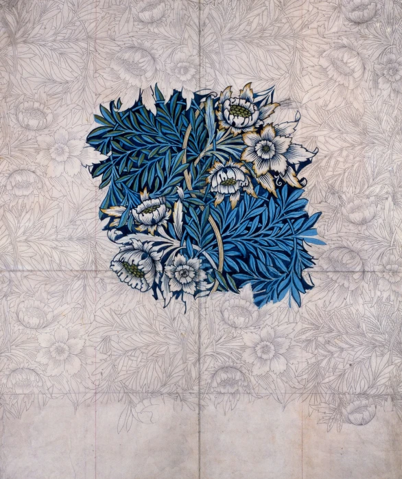 an artistic design on a wall made out of blue leaves