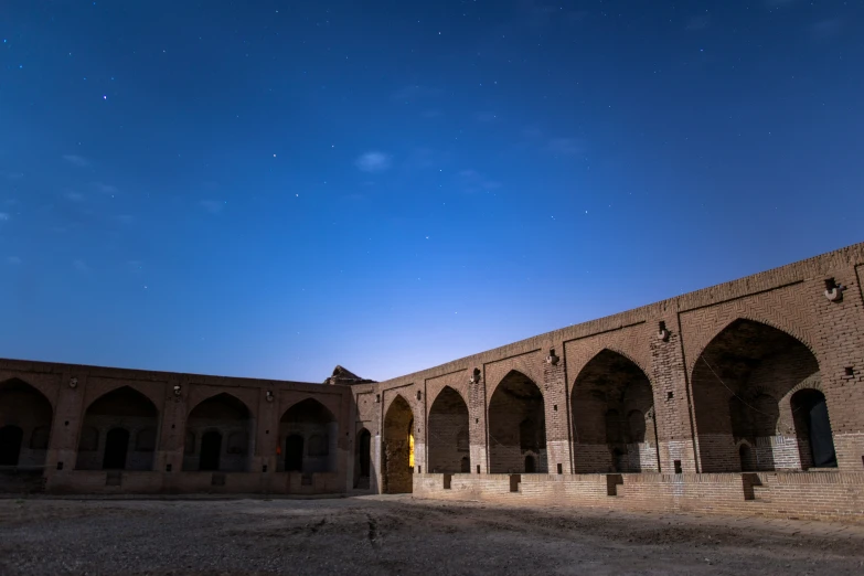 a large building with multiple arches in it