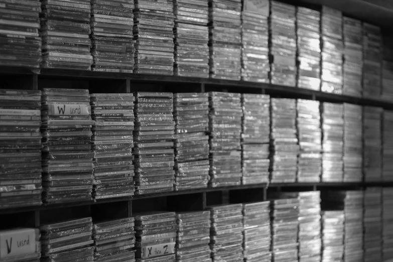 rows of cd's in black and white pograph