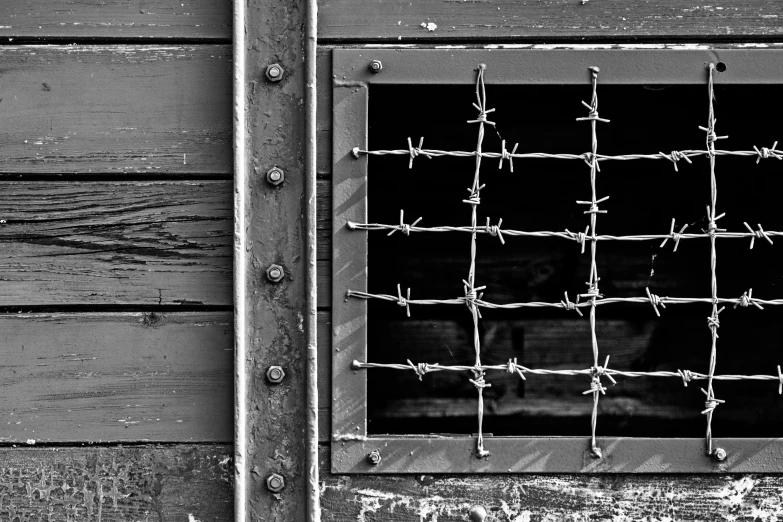 a black and white po of barbed wire