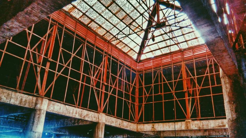 a building being constructed inside and with steel bars