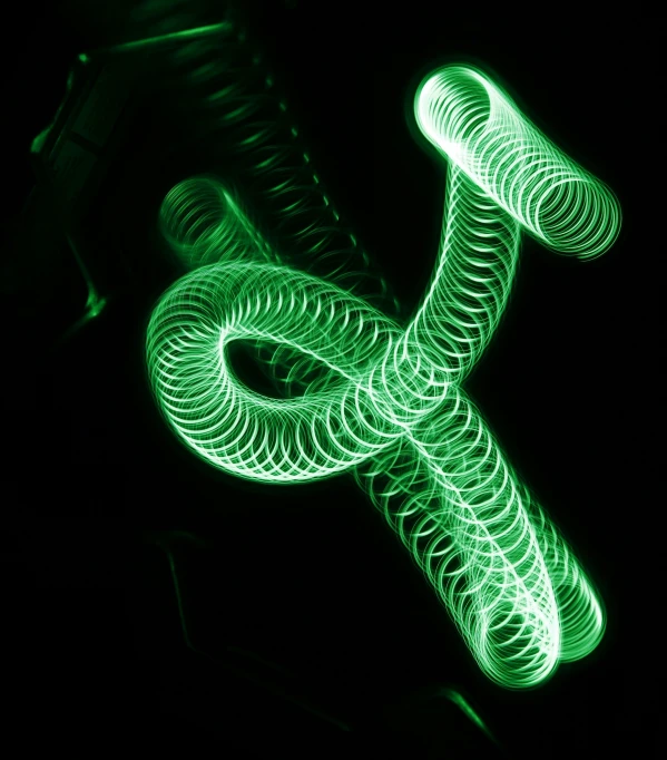 green glow snake pattern on black background