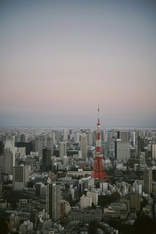 a cityscape with a tower in the center