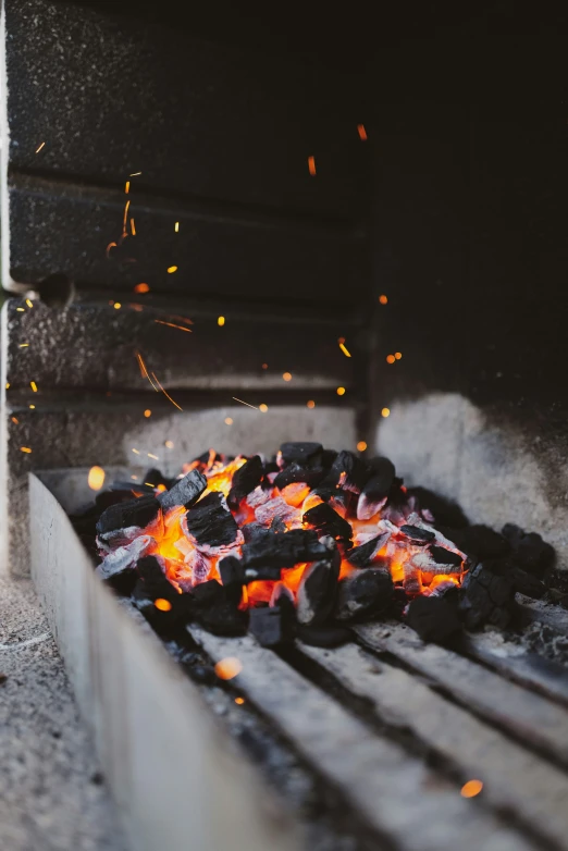 a grill full of  coal and fire retardants