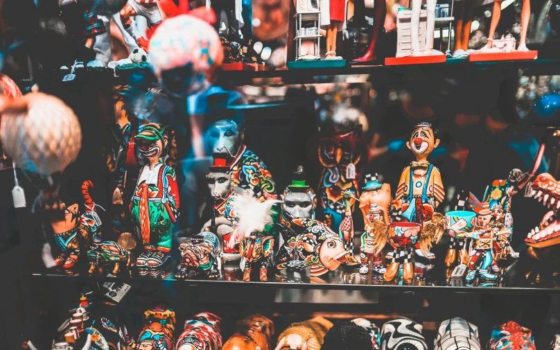 many different colored figurines on display in a store