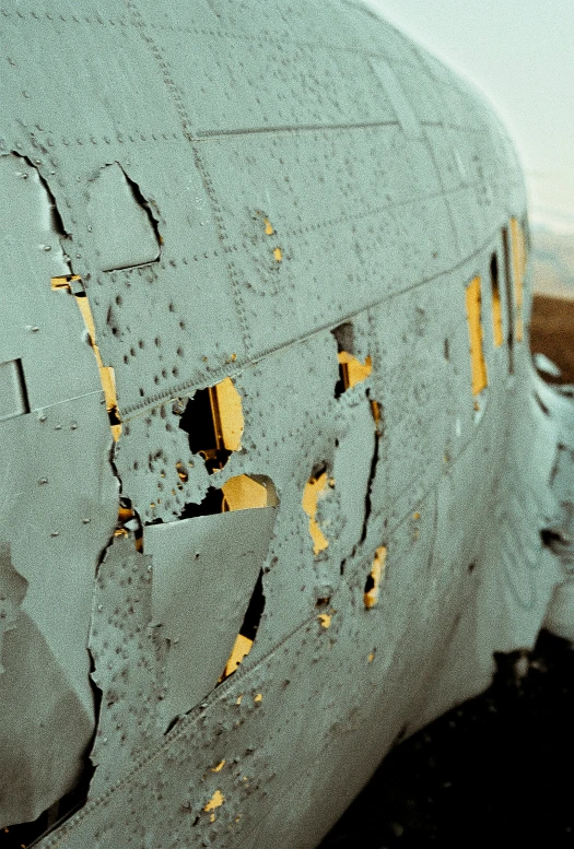 the paint chipping on an airplane is brown