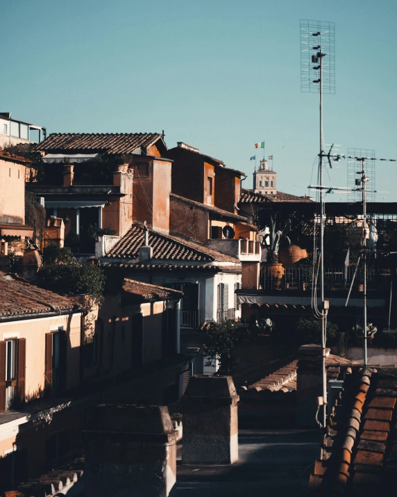 the top of some buildings next to the bridge