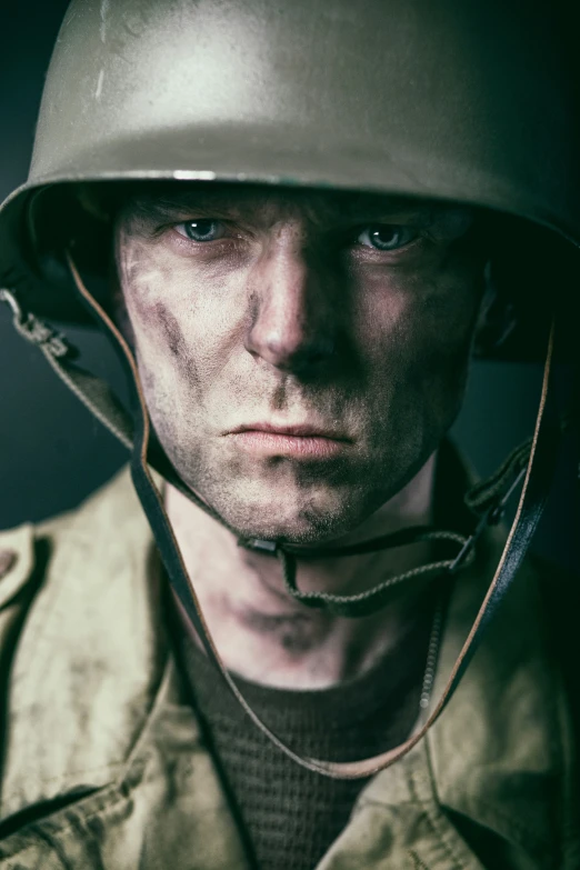 a man in army uniform with helmet on