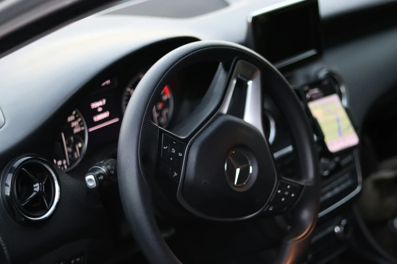 there is a steering wheel and dashboard in the car