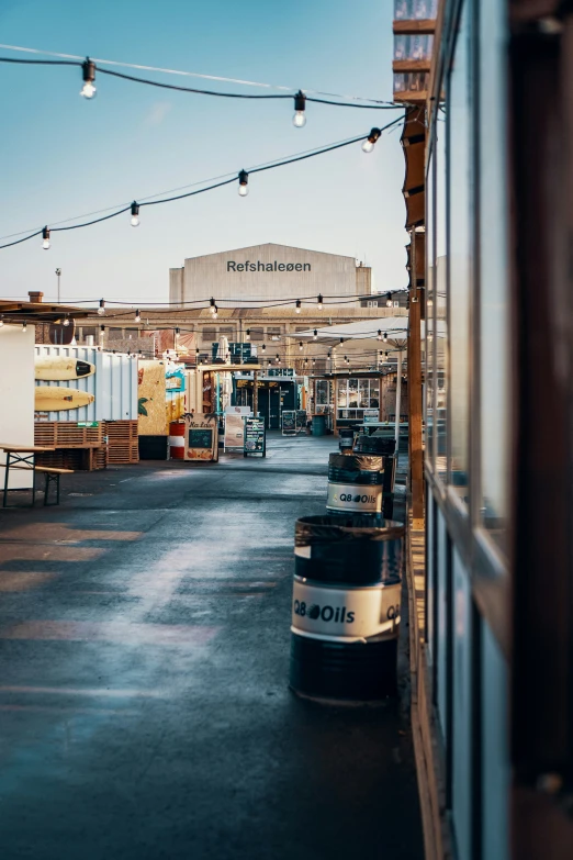 a parking lot filled with lots of furniture and lights