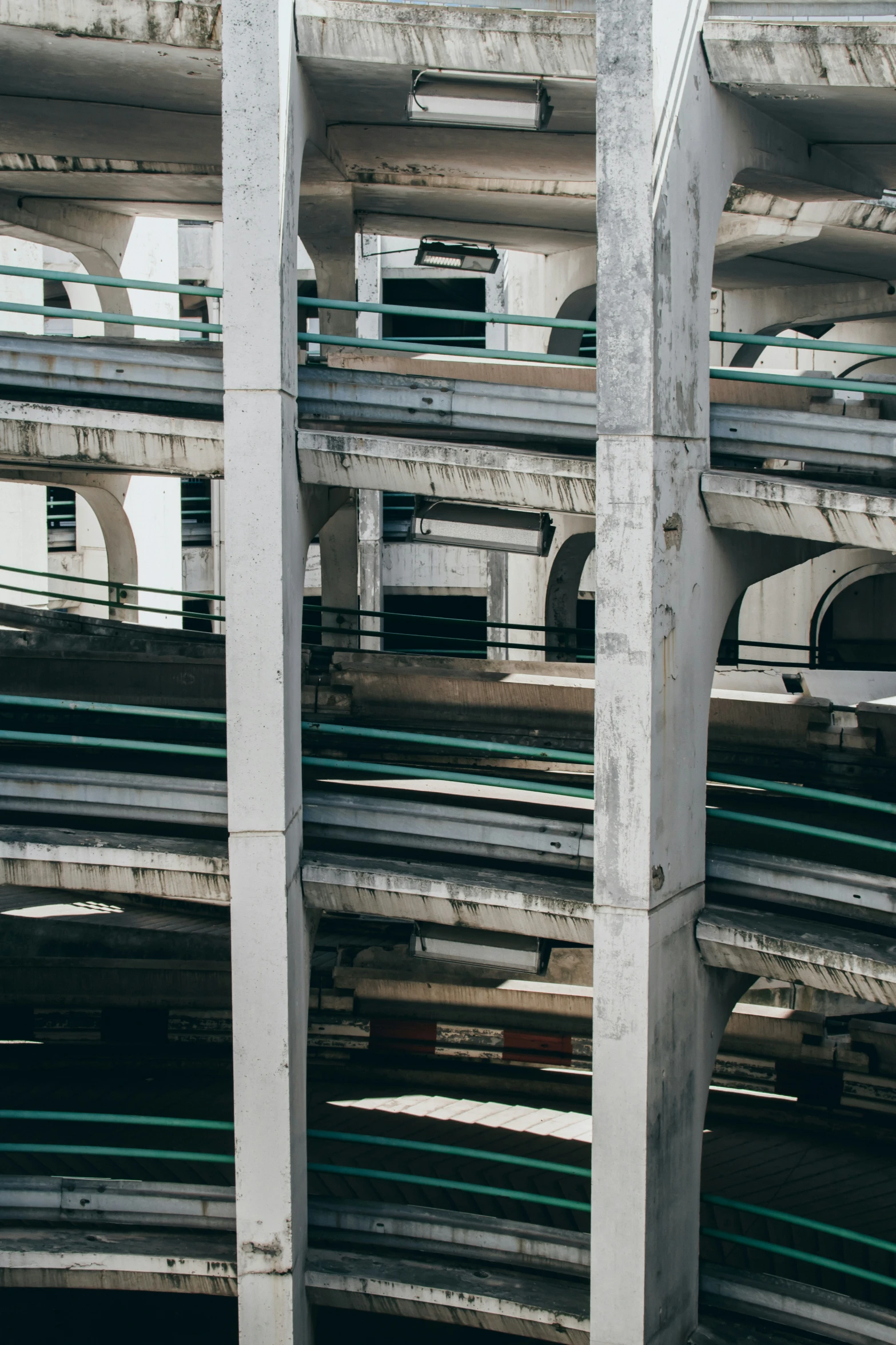 several stacks of building pipes, with one of them holding traffic