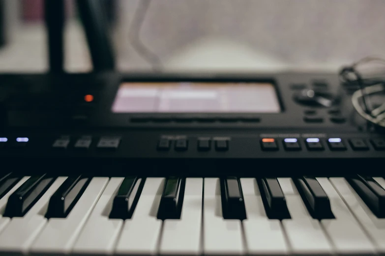 a close - up of the keys and pedals of a piano