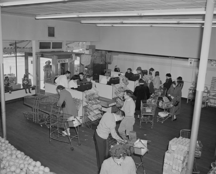 people in line at an assembly line and some are doing various things