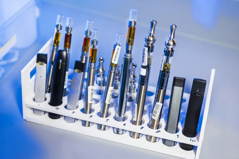 various electronic cigarettes are lined up on display