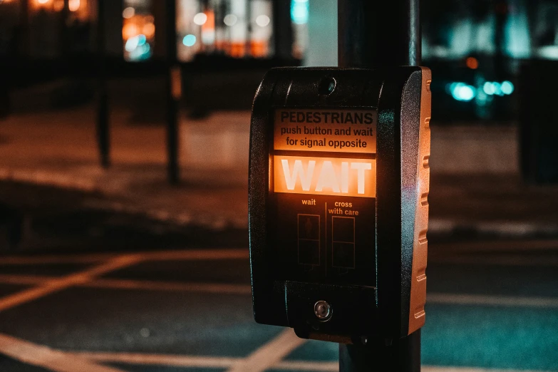 a dark city night time image with a street light in the background