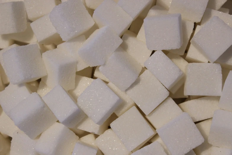 a close up of a bunch of sugar cubes
