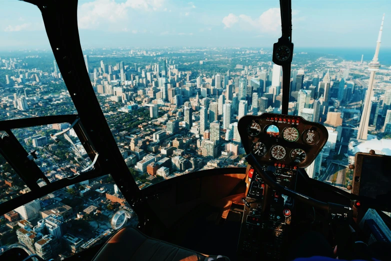 a large city skyline viewed from the top of a skyscr