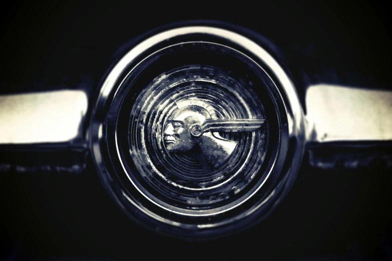 the inside of an old camera with its lens pointed forward