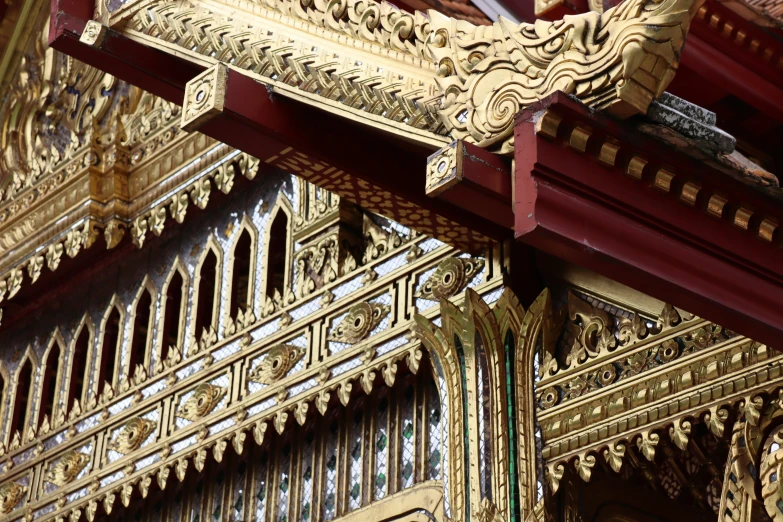 a close up view of a gold, ornate object