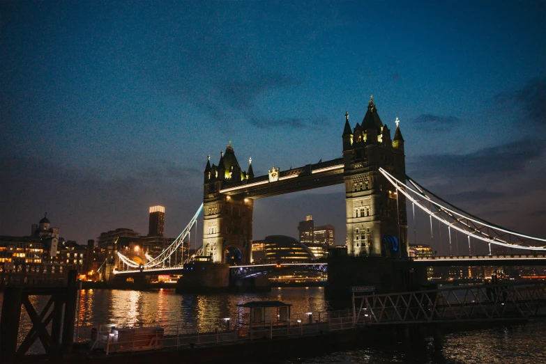 a night scene of the tower bridge, london england