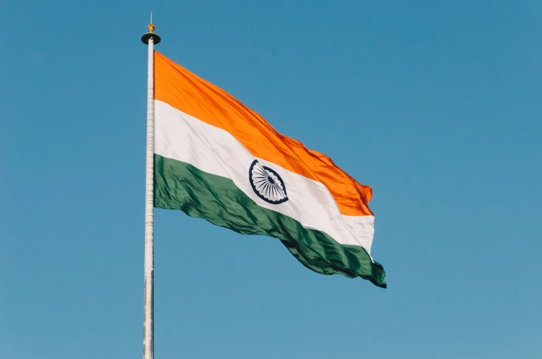 the india flag on a metal pole