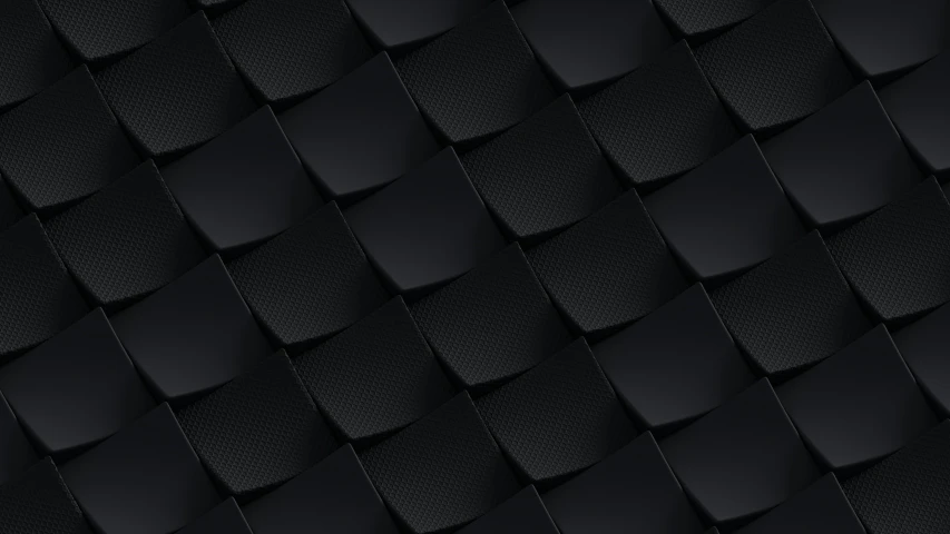 black woven material with folds in a diagonal pattern