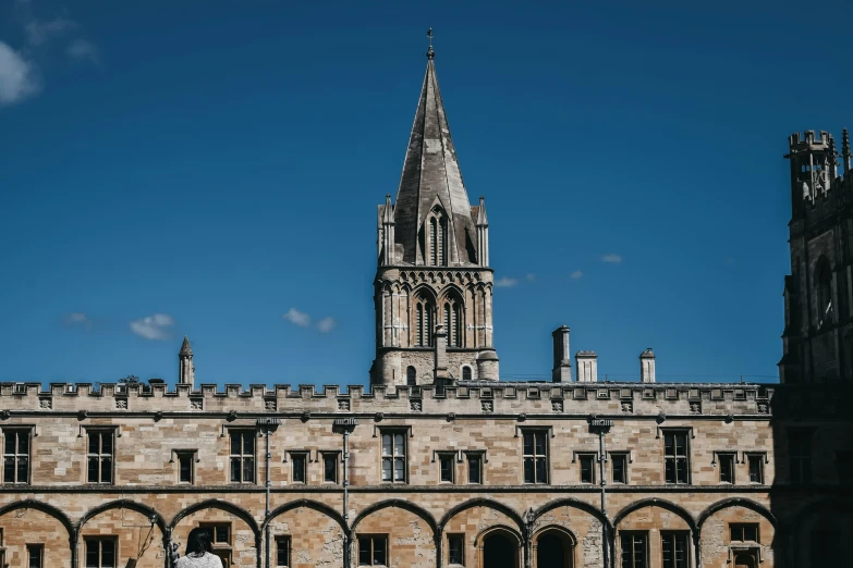 a picture of an old building with a tall clock tower