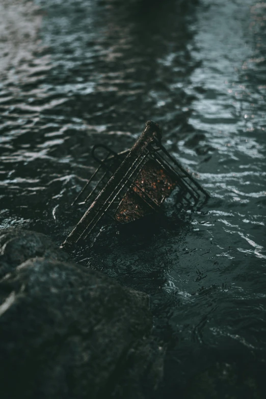 a net sits in the water by itself