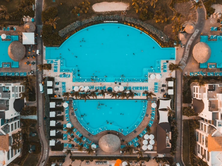 an aerial view of a el pool in the middle of the day