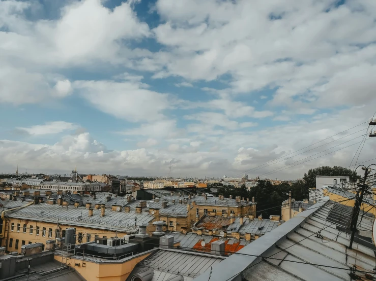 a blue sky over a large city with buildings