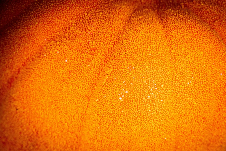 orange colored pattern texture in a blurry frame