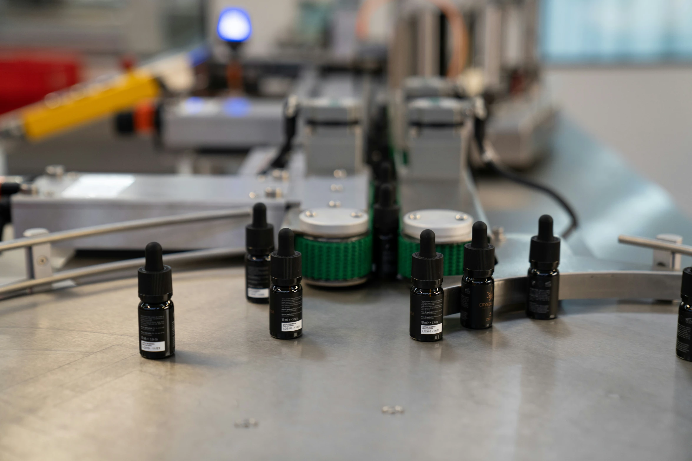 electronic equipment are shown together on a conveyor belt