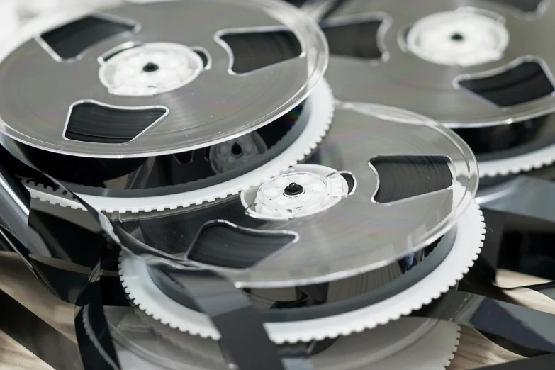 a group of black plastic discs sitting on top of a table