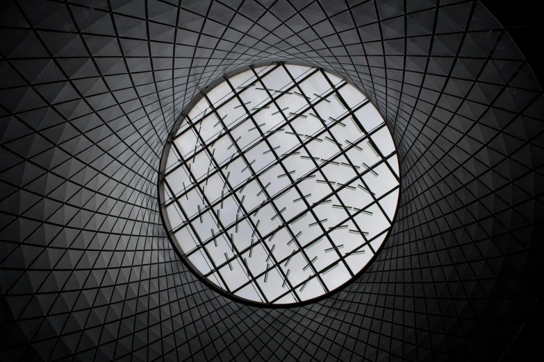 a circular window that is surrounded by lots of squares