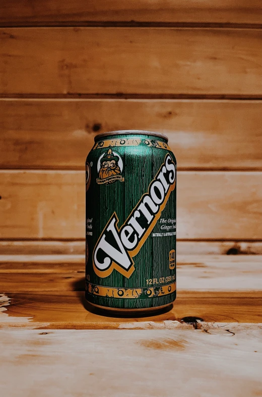 a canned soda sits on a countertop