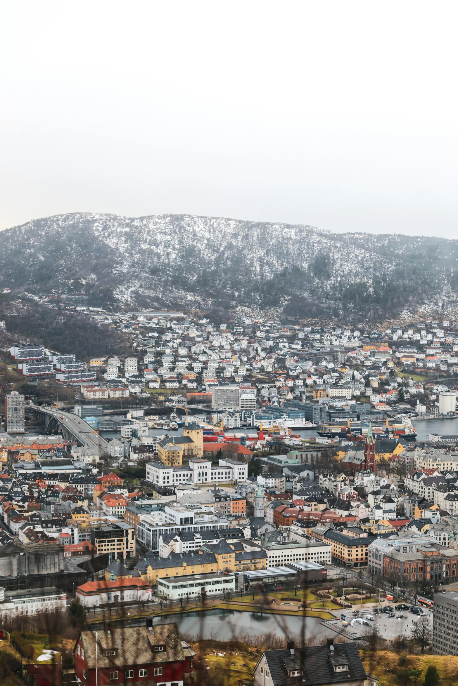 a snowy city on top of a hill